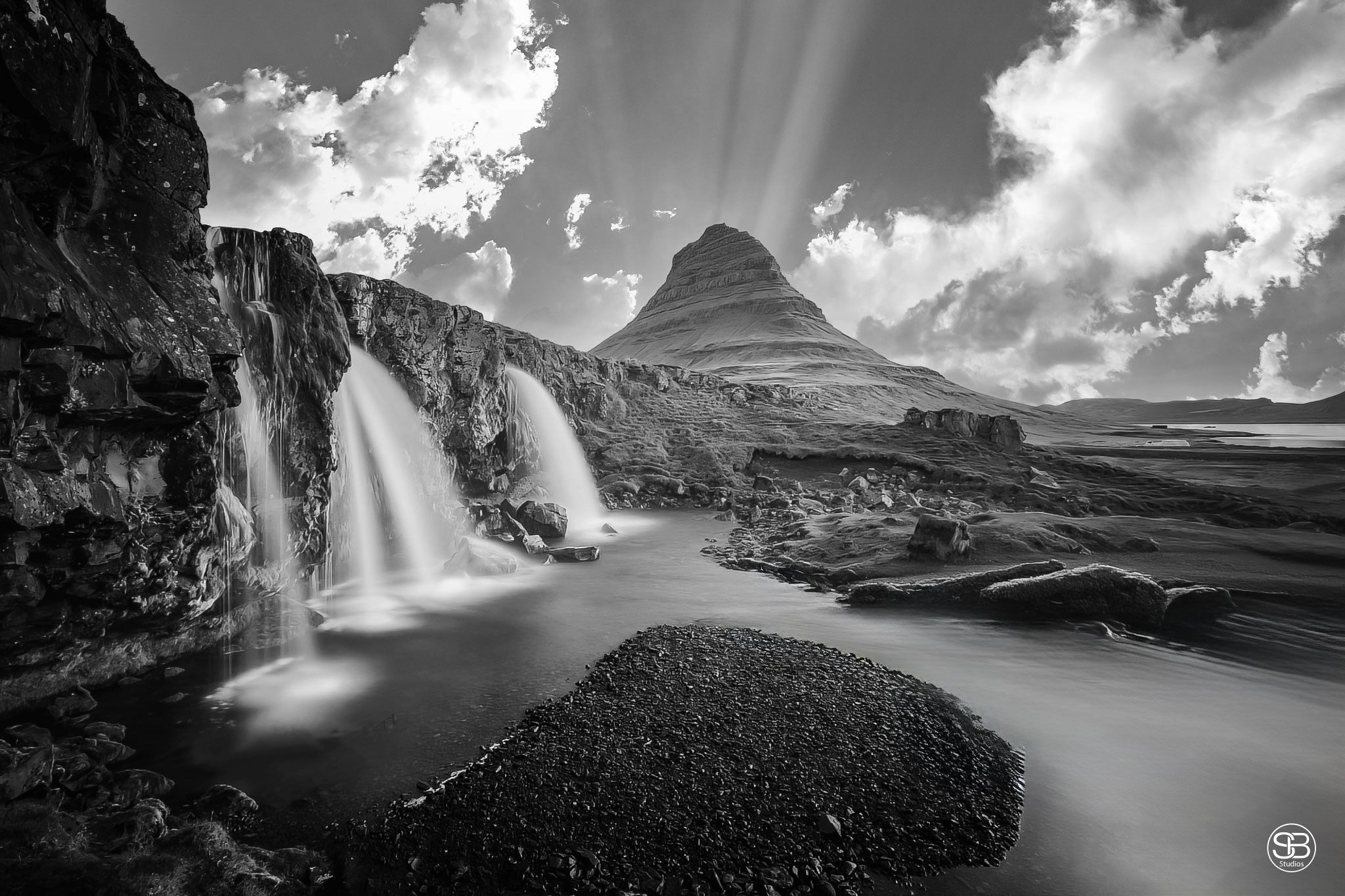 Mount Kirkjufell and Kirkjufellsfoss waterfalls in Snæfellsnes, Iceland by SB Studios 2024
